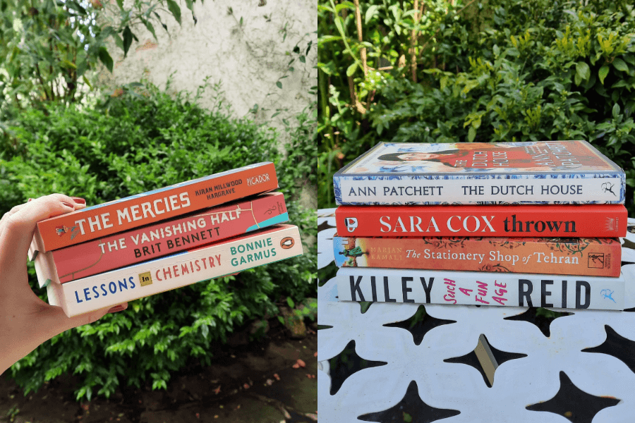 Two small stacks of books from a charity shop.